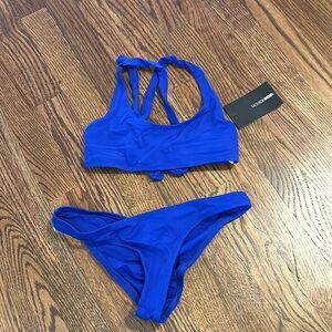 Fashion nova never worn tags on bikini with a scrunch but and tie top in back
